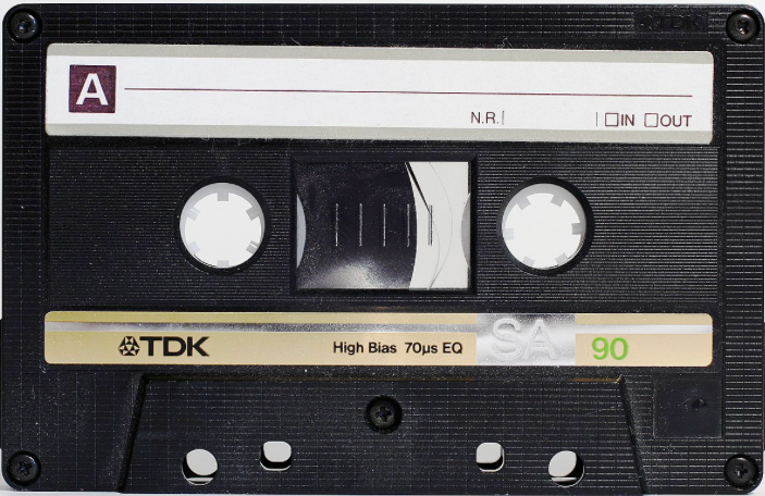 A TDK cassette tape labeled 'A' with no recording indication, showcasing a classic black design.