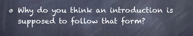 A chalkboard with a question written in white chalk: 'Why do you think an introduction is supposed to follow that form?'